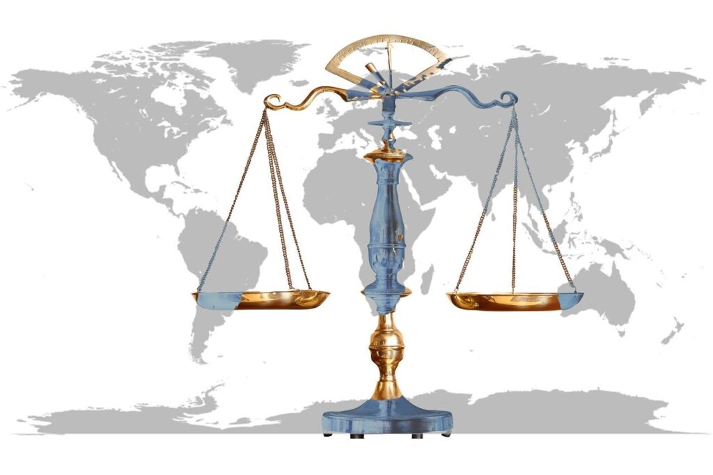 A gold and blue scale on top of a map.